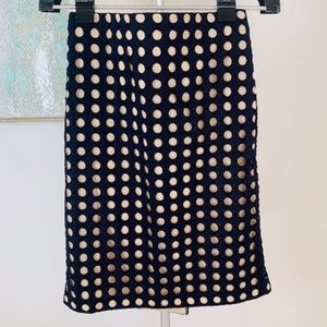 Ann Taylor blue polka dot cut over beige skirt. 4.